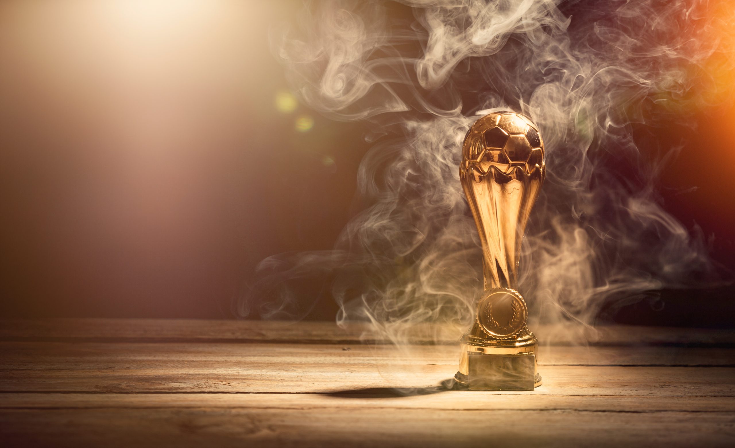 Celebrate Achievements with Our Ball Holder Trophies